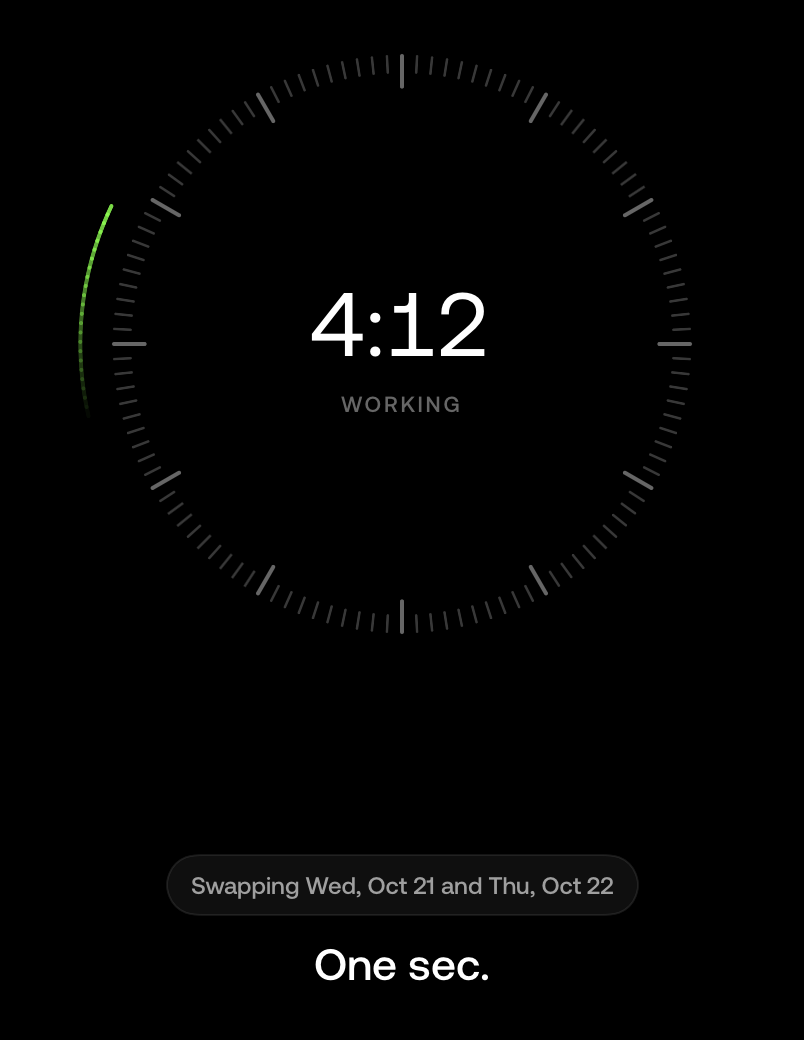 Call screen, labelled Working: a chip reads Swapping Wed, Oct 21 and Thu, Oct 22, over the words One sec.